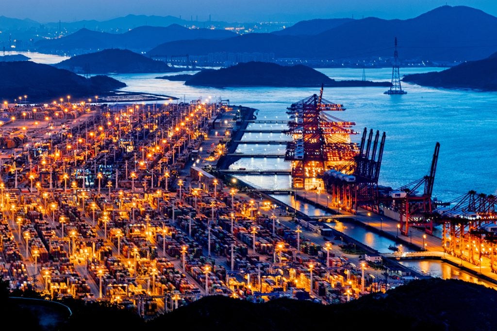 Aerial view of Ningbo-Zhoushan Port at night, one of the busiest container ports in the world