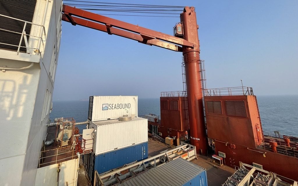 Containers containing Seabound's carbon capture technology seen on the deck of a ship