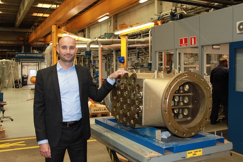 DESMI Ocean Guard CEO Rasmus Folsø in front of CompactClean UV unit